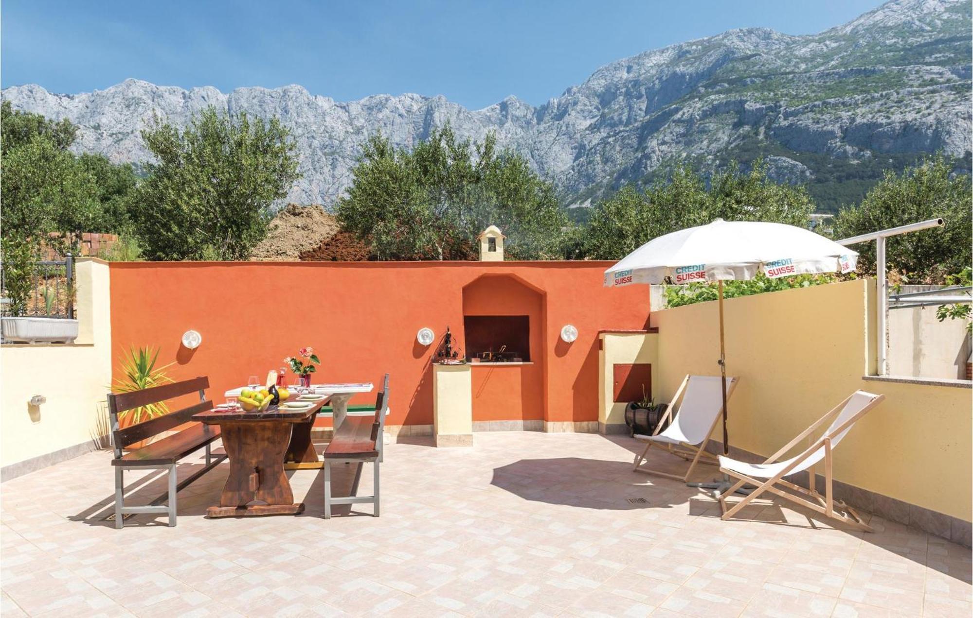 Nice Apartment In Makarska With House Sea View Екстериор снимка